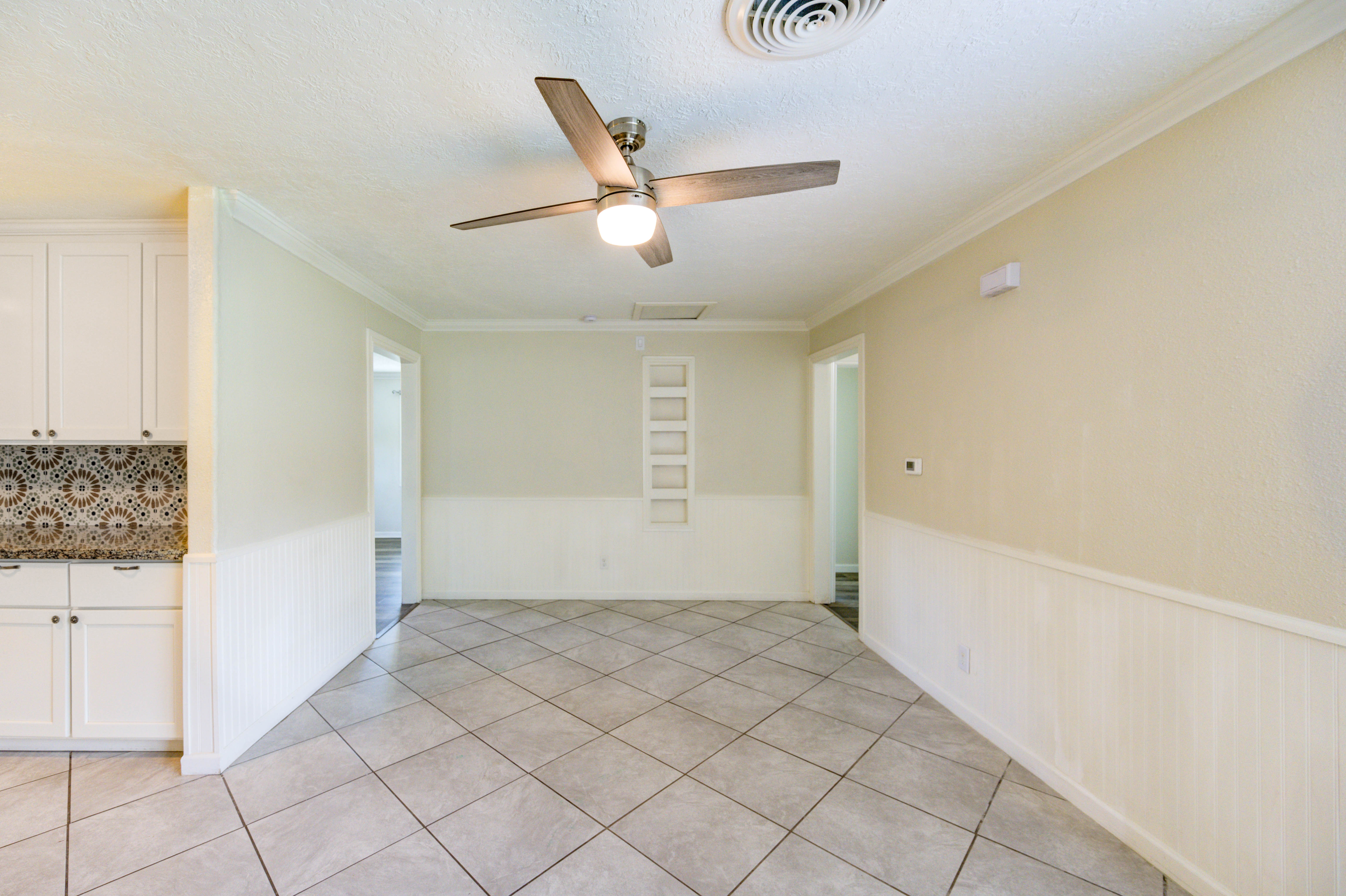 Dining area with ceiling fan