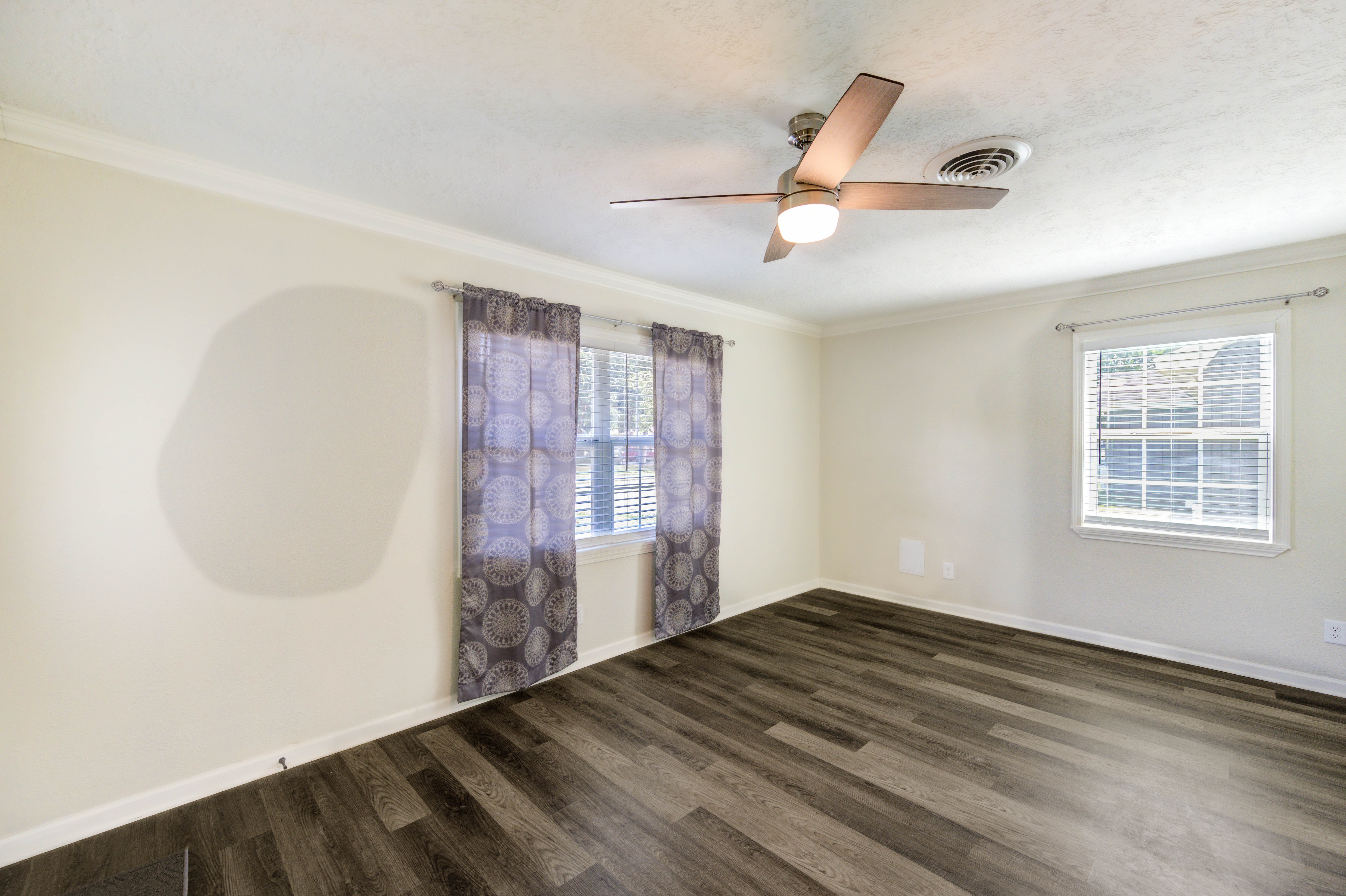 Comfortable living area with ceiling fan