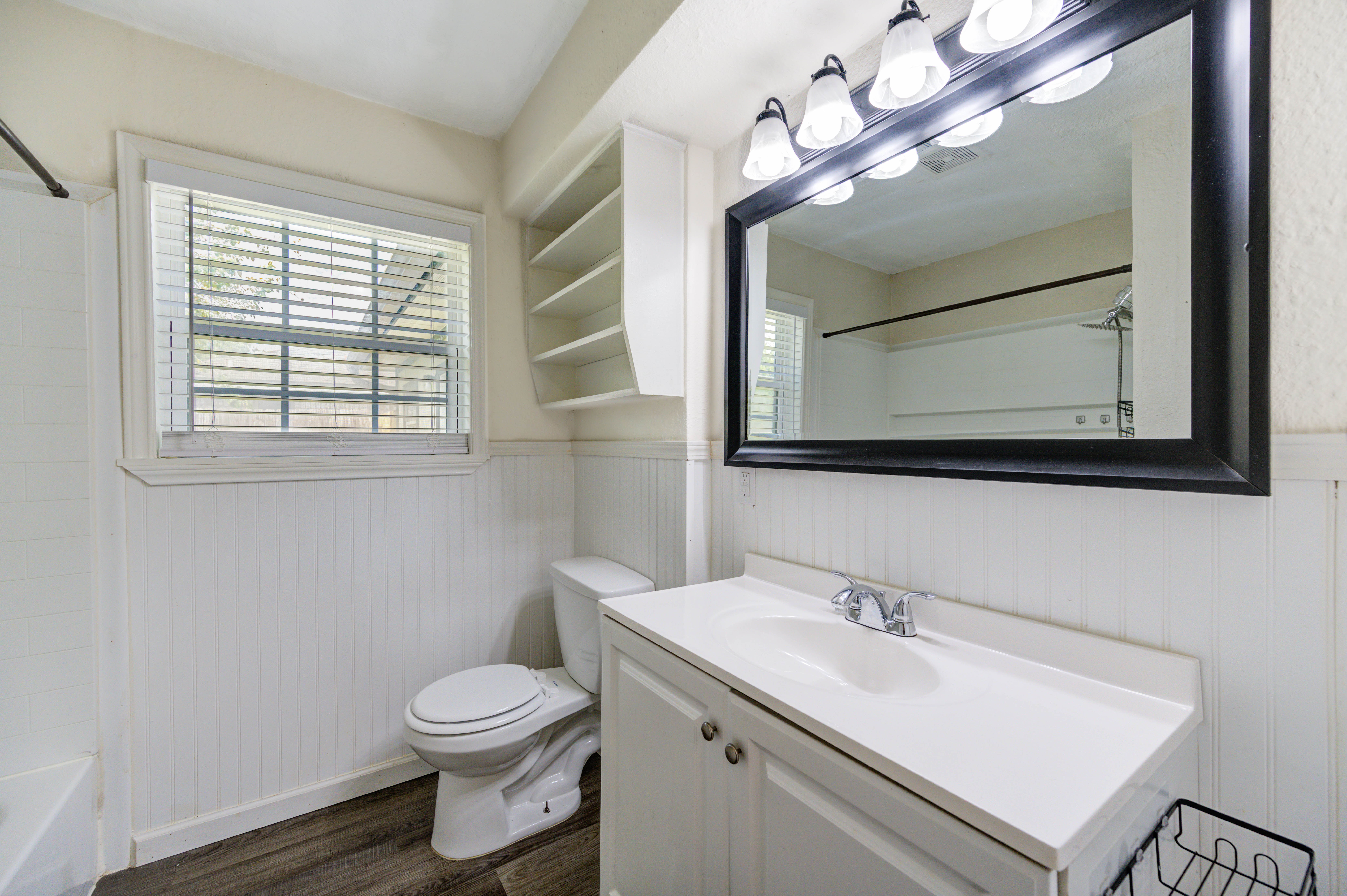 Bedroom with windows on two sides